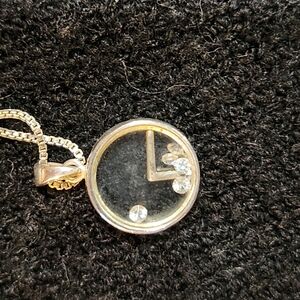 Elegant Gold and Silver Pendant Necklace